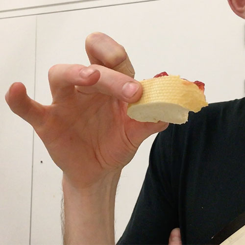 Bread with jam in hand of audience member